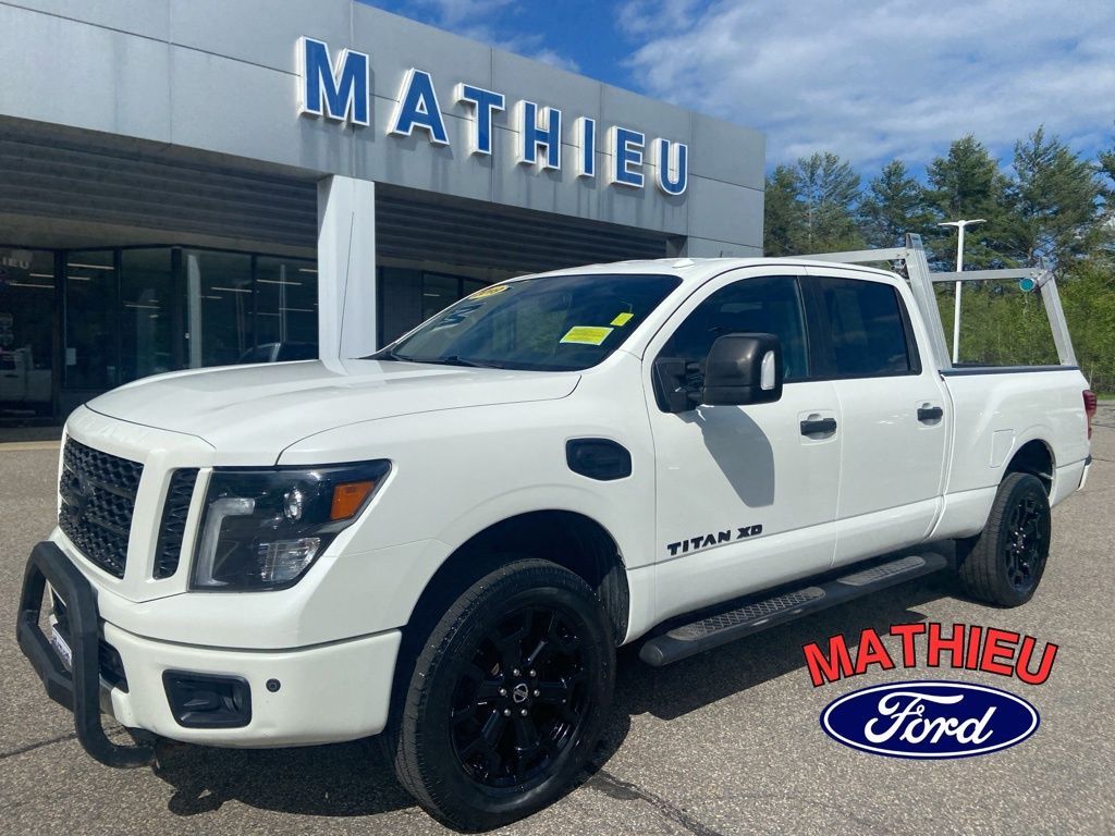 Pearl White 2019 Nissan Titan Pickup Truck Four-Wheel Drive 6-Speed Automatic