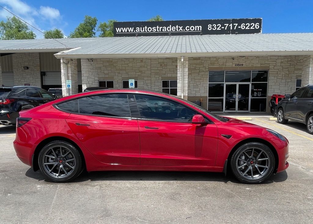 2023 Tesla Model 3 Base Red at Ultimate Motorsports