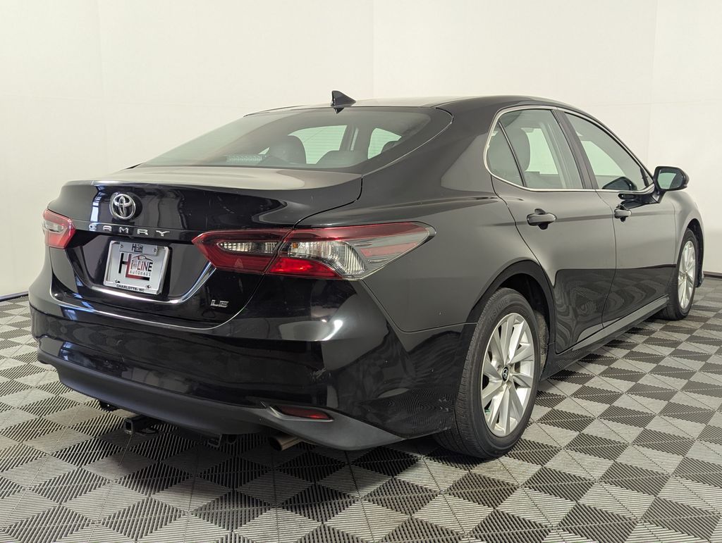 2024 Midnight Black Metallic Toyota Camry LE FWD Sedan