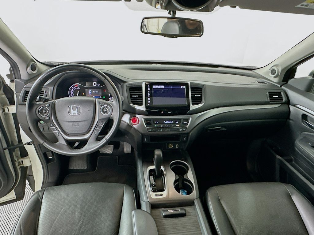 View vehicle photo 3