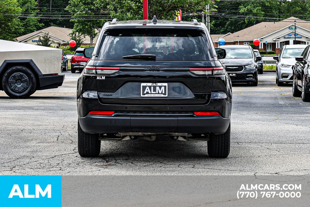 Used 2025 Black Jeep Altitude / MT Certified image 12