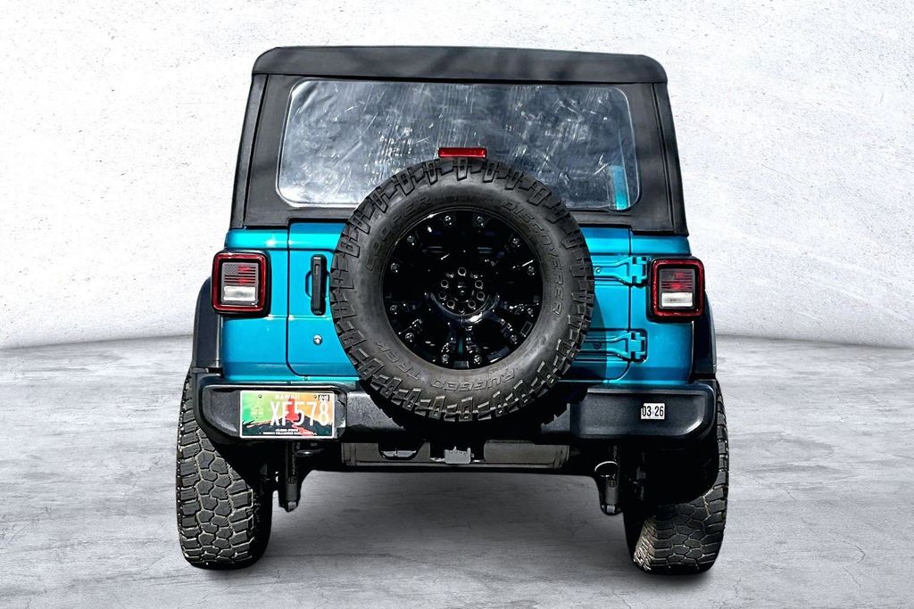 Used 2020 Teal Jeep Unlimited Sport image 4