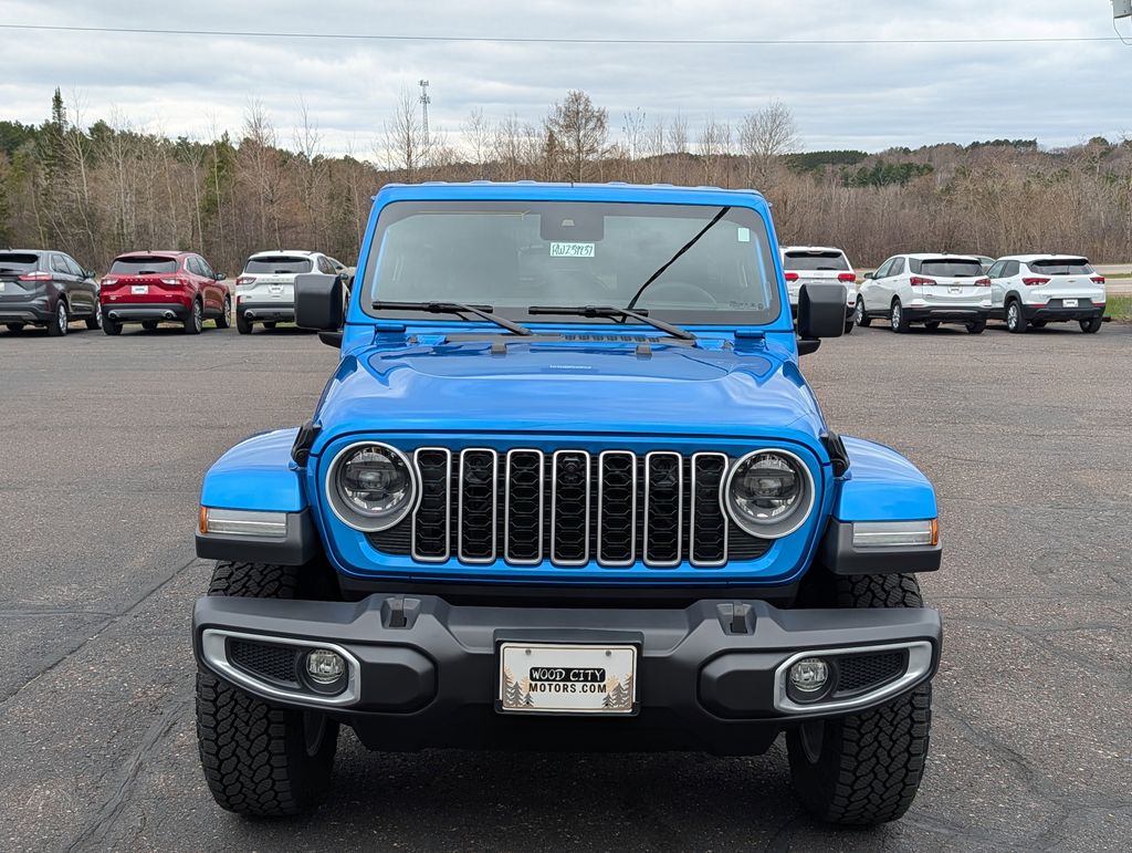 Used 2024 Jeep Wrangler 4-Door Sahara with VIN 1C4PJXEG7RW239937 for sale in Cloquet, Minnesota
