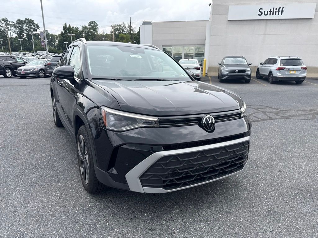 2025 Volkswagen Taos 1.5T SE Black at Sutliff Volkswagen