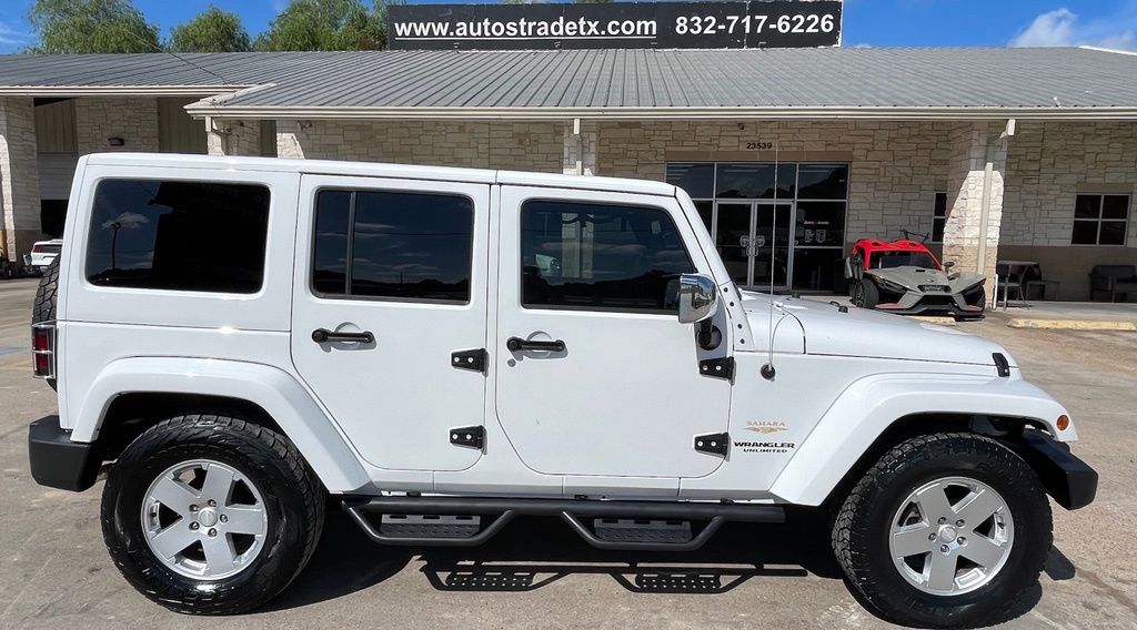 2011 Jeep Wrangler Unlimited Sahara White at Emmons Autoplex