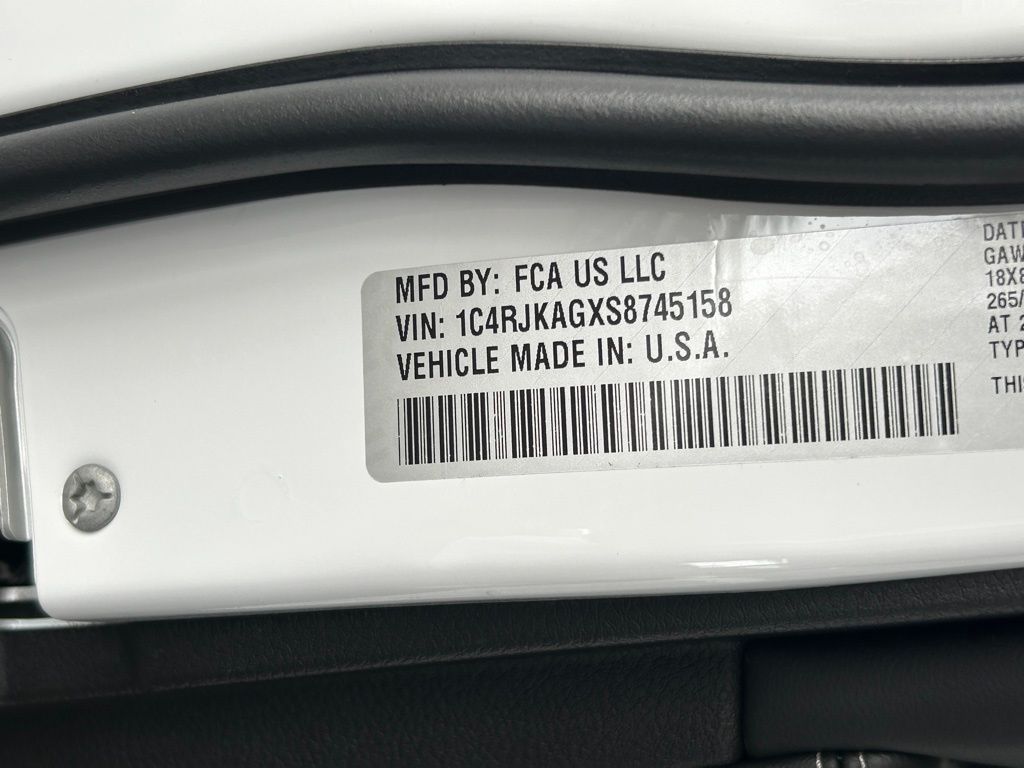 Used 2025 Bright White Clearcoat Jeep Laredo image 52