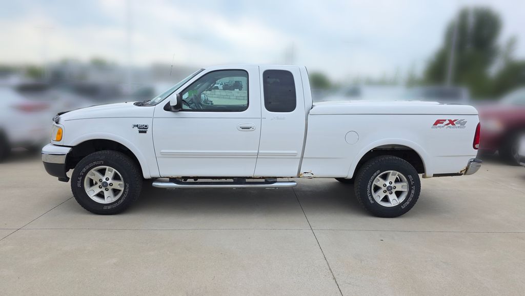 Used 2003 Ford F-150 Lariat with VIN 1FTRX18L43NB10709 for sale in Kansas City