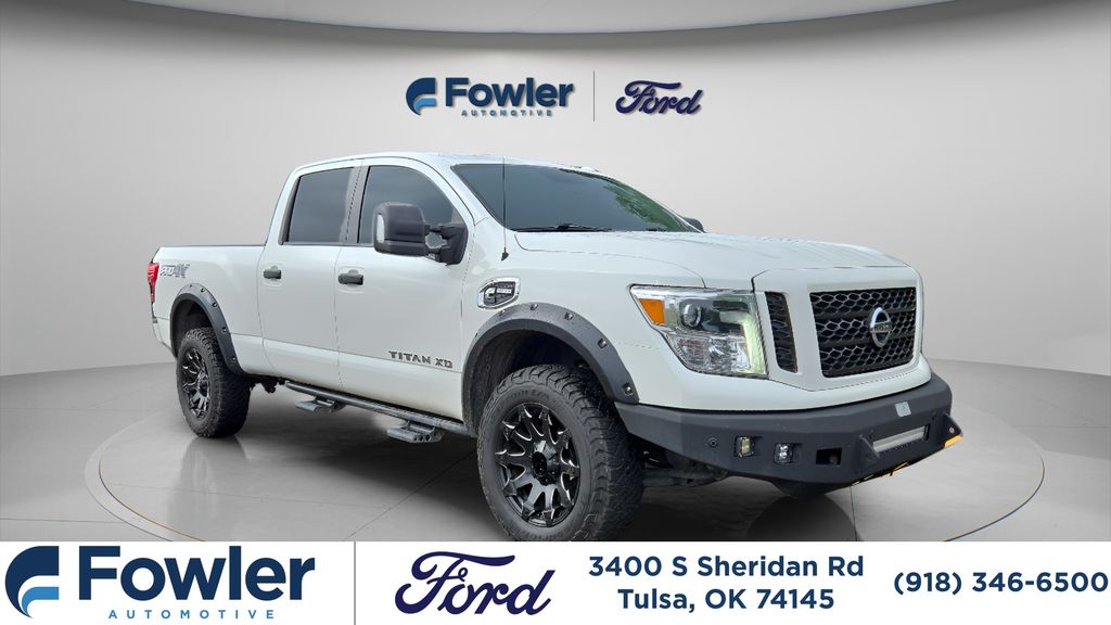 Pearl White 2019 Nissan Titan Pickup Truck Four-Wheel Drive 6-Speed Automatic