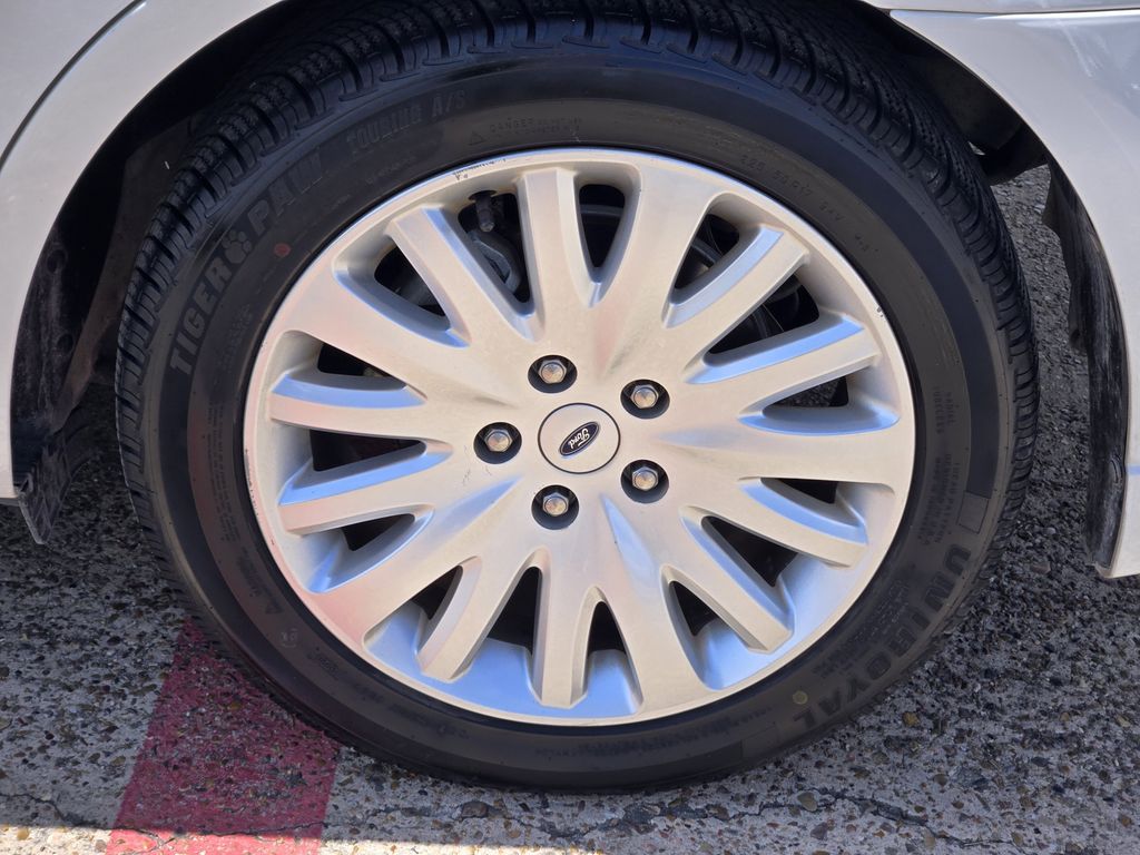 2012 Ford Fusion Hybrid Base White at Shottenkirk Kia Fort Bend