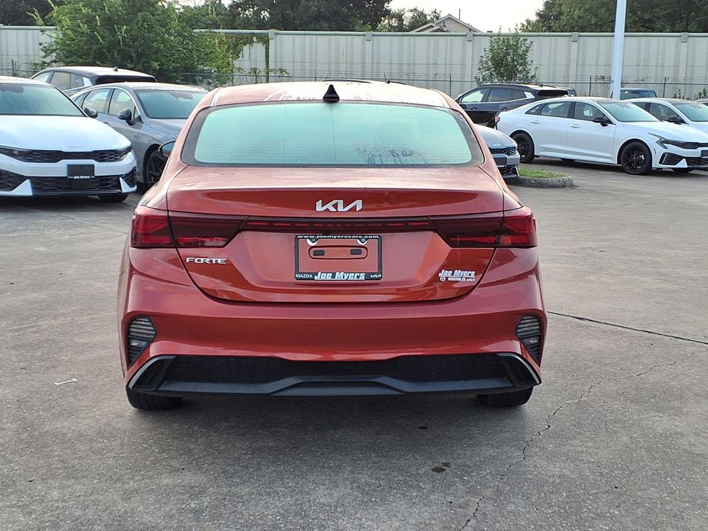 2023 Kia Forte LXS Red at Shottenkirk Kia Fort Bend