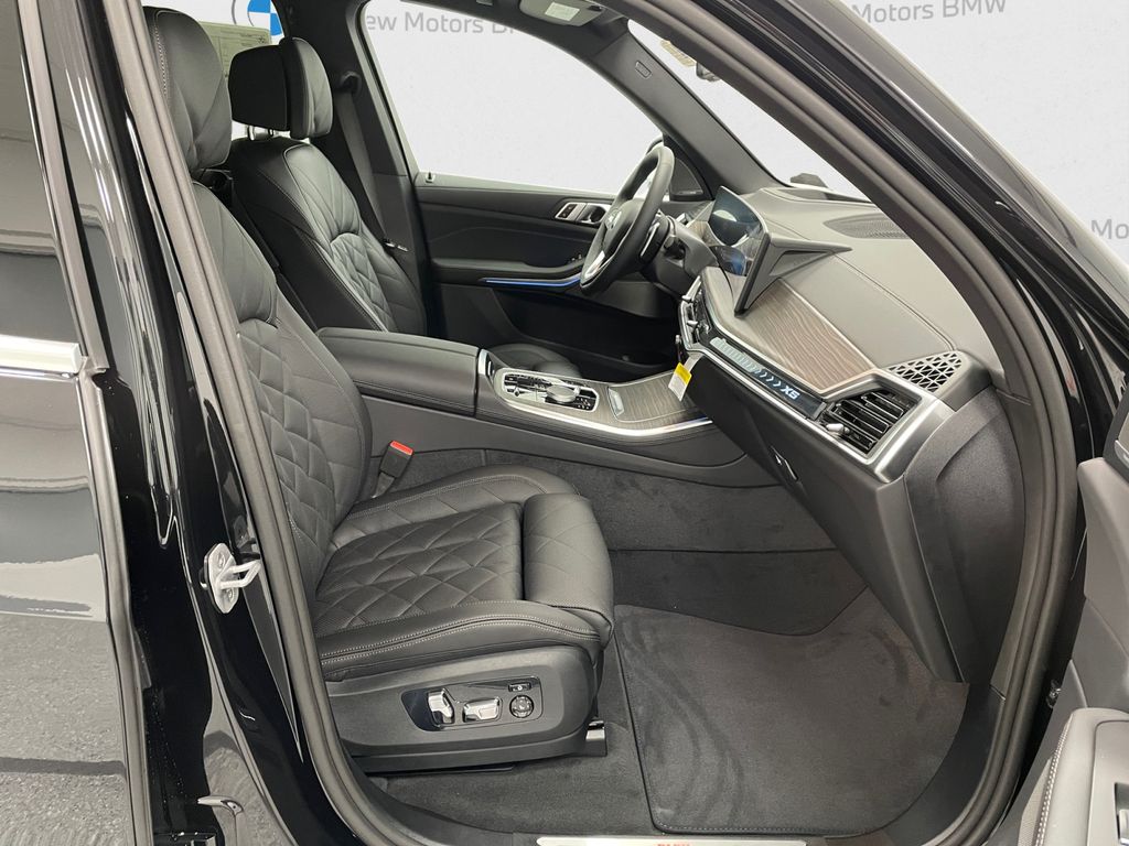 New 2026 Black Sapphire Metallic BMW xDrive50e image 12