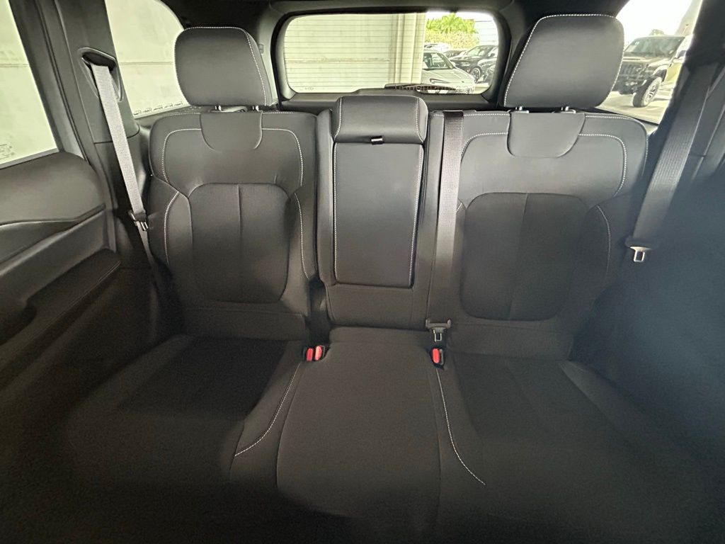 Used 2025 Bright White Clearcoat Jeep Laredo image 13