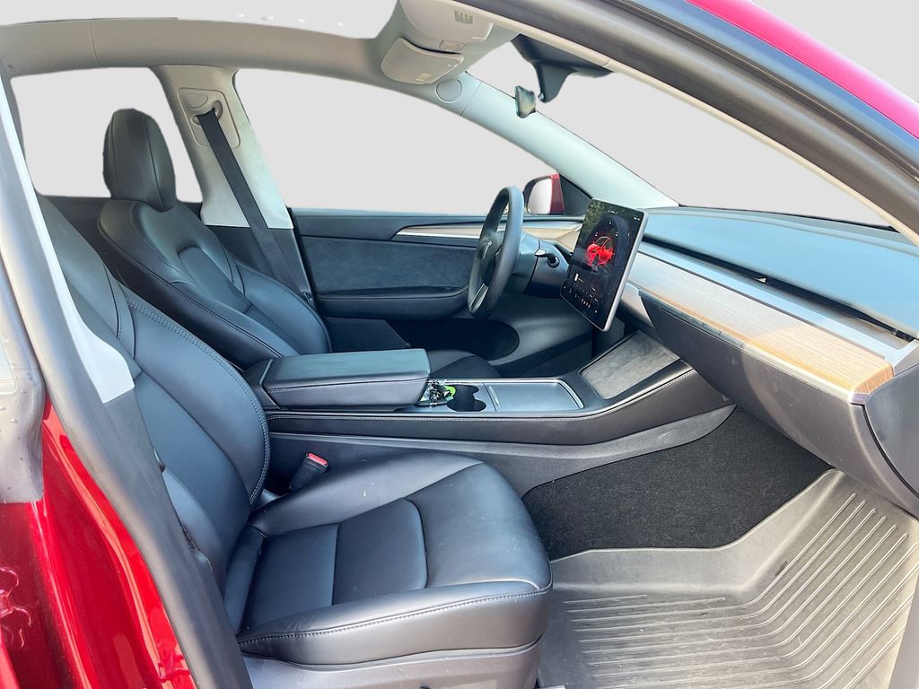 2025 Tesla Model Y Long Range Red at AutoSavvy Houston Northwest