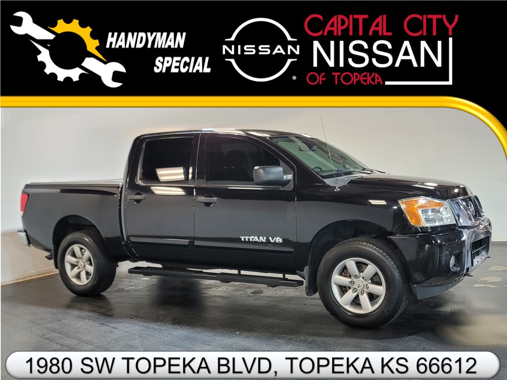 Galaxy Black Metallic 2014 Nissan Titan Pickup Truck Four-Wheel Drive 5-Speed Automatic