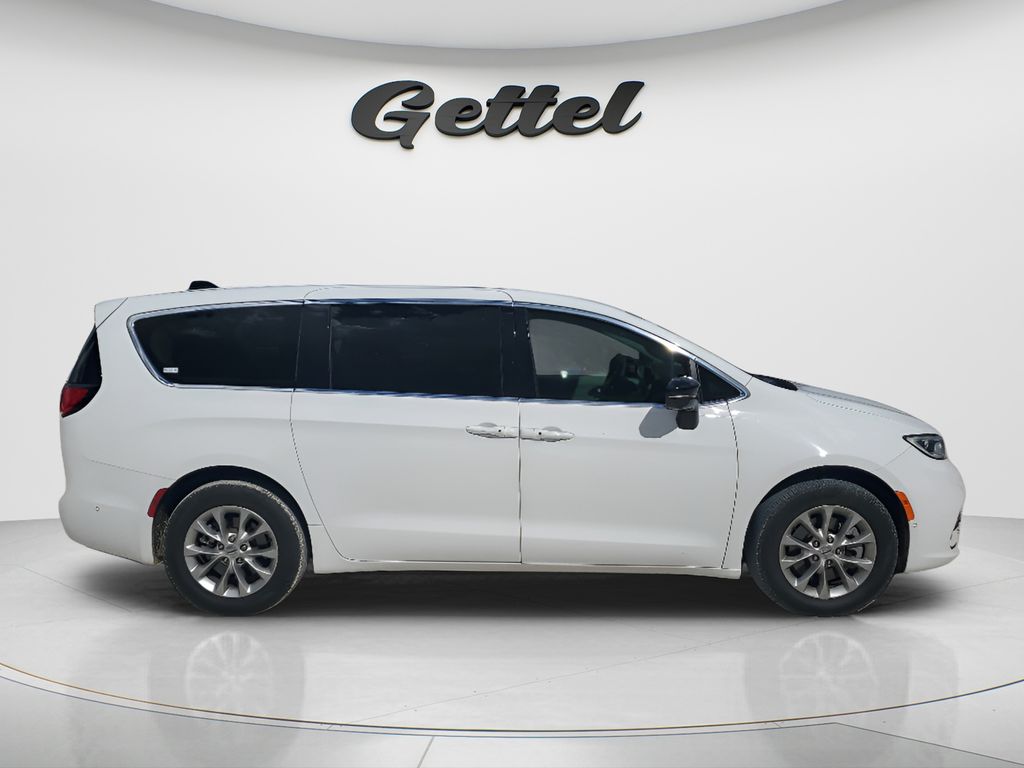 View vehicle photo 3