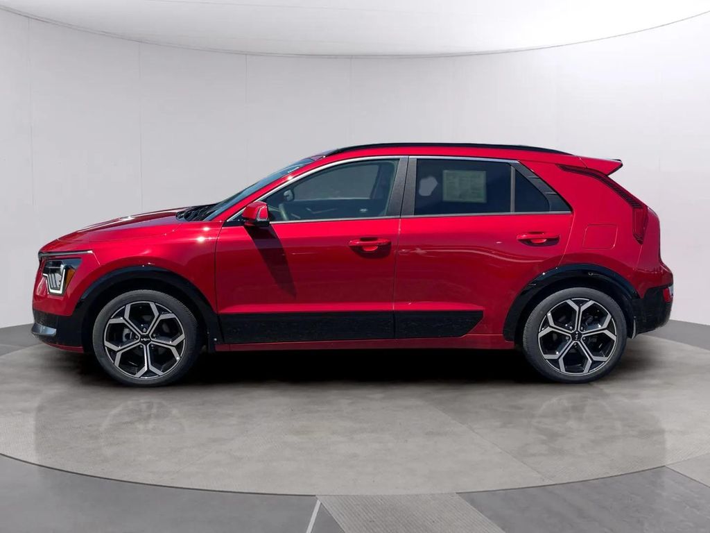 Certified Used 2025 Runway Red Kia EX Touring image 2