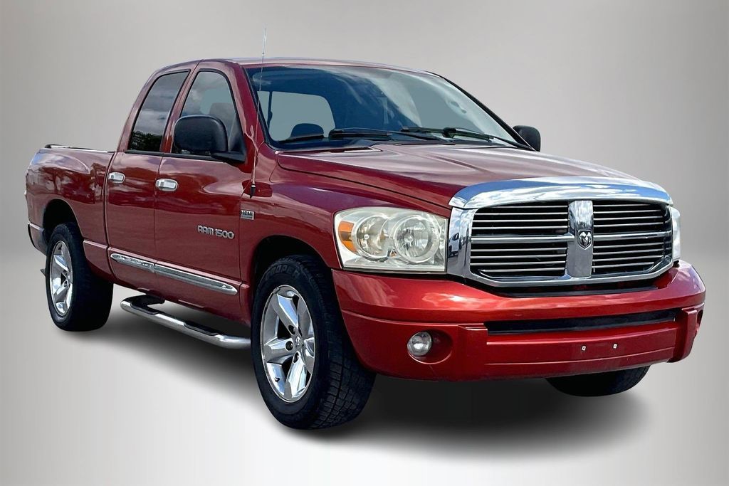 Sunburst Orange Pearl 2007 Dodge RAM 1500 Laramie Quad Cab RWD Pickup Truck Rear-Wheel Drive 5-Speed Automatic