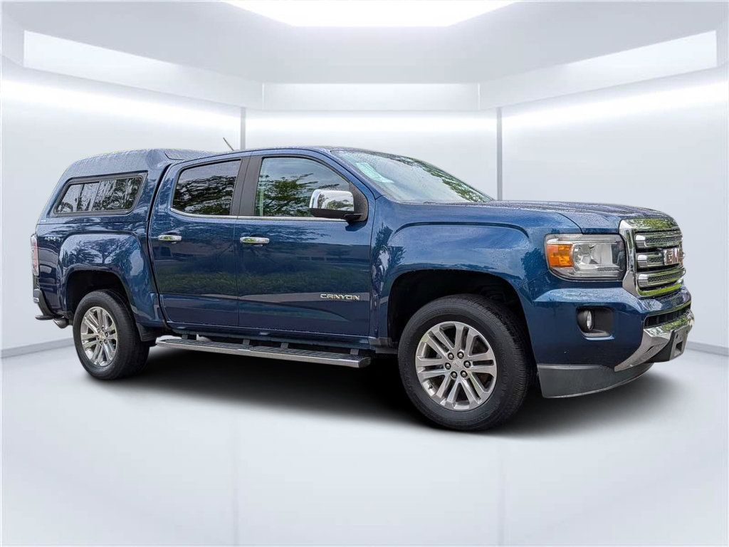 Blue Emerald Metallic 2019 GMC Canyon Pickup Truck Four-Wheel Drive 8-Speed Automatic