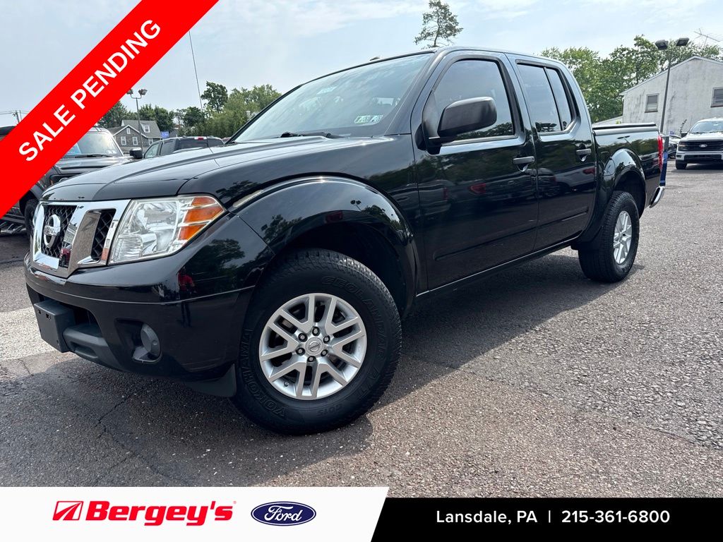 Super Black 2014 Nissan Frontier Pickup Truck Four-Wheel Drive 5-Speed Automatic Overdrive