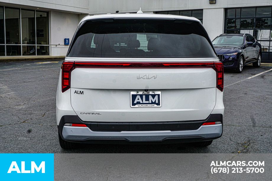 Used 2025 White Kia LXS image 11