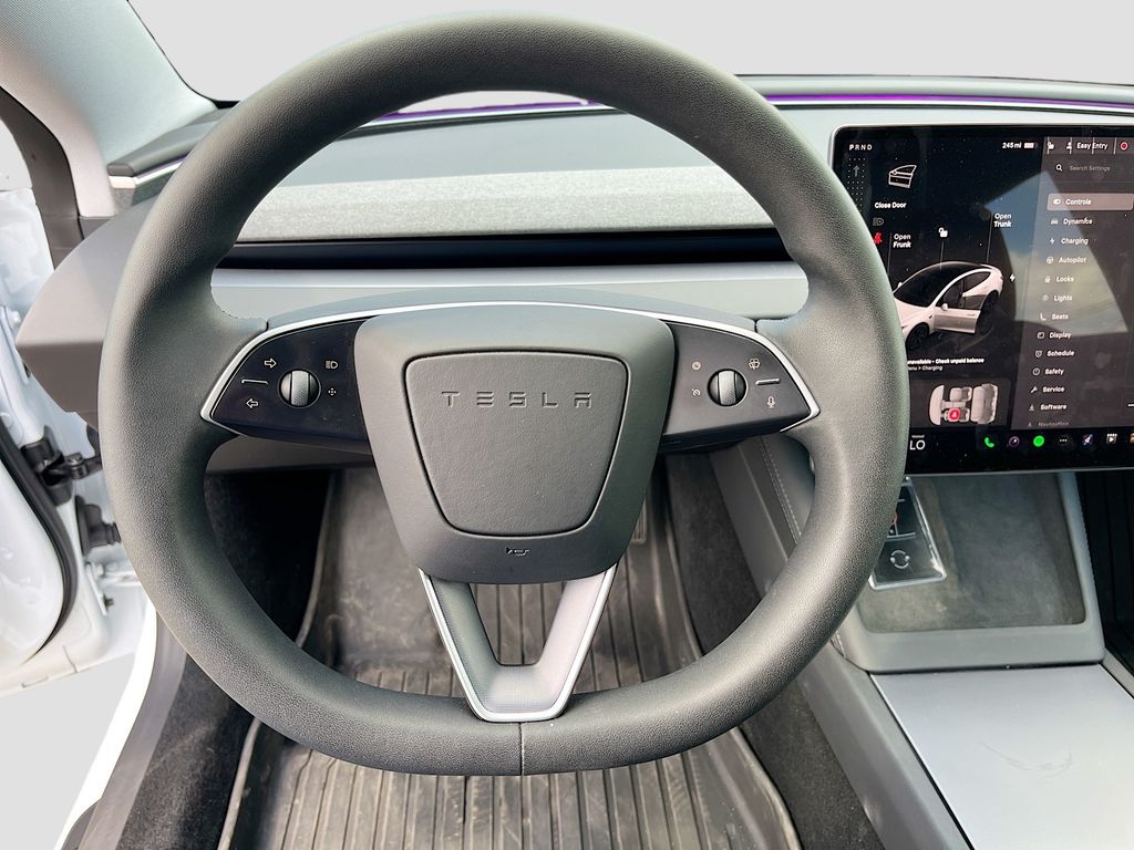 2025 Tesla Model 3 Long Range White at AutoSavvy Houston Northwest