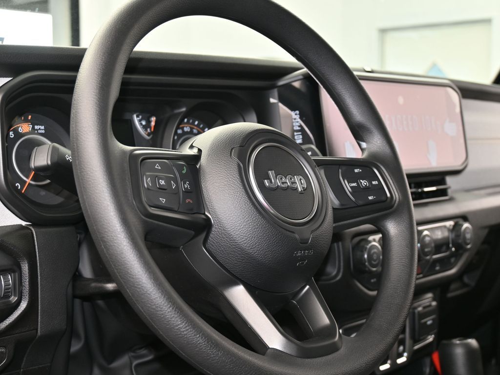 New 2026 black clearcoat Jeep Sport image 13