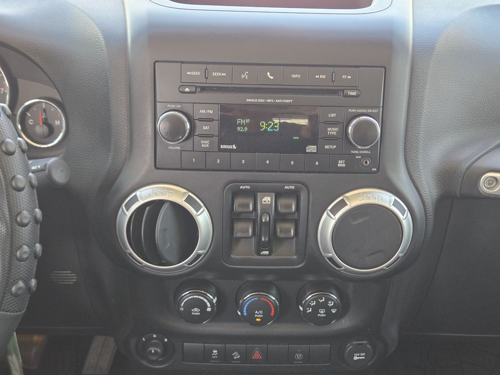 2015 Jeep Wrangler Unlimited Sahara White at DeMontrond Automotive Group