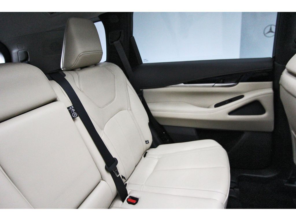 2025 INFINITI QX60 PURE Black at Central Houston Nissan