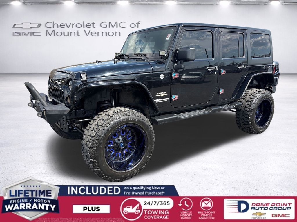 Black Clearcoat 2012 Jeep Wrangler Unlimited Sahara 4WD SUV / Crossover Four-Wheel Drive 5-Speed Automatic