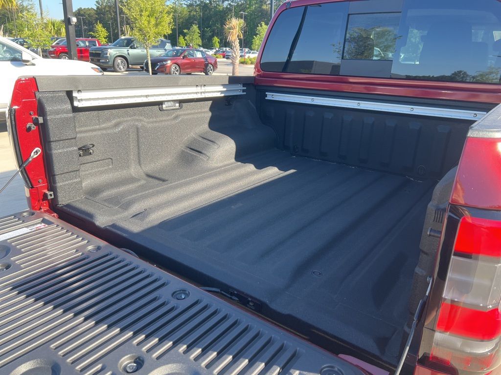 2025 Cardinal Red Metallic Tricoat Nissan Frontier SL RWD Truck