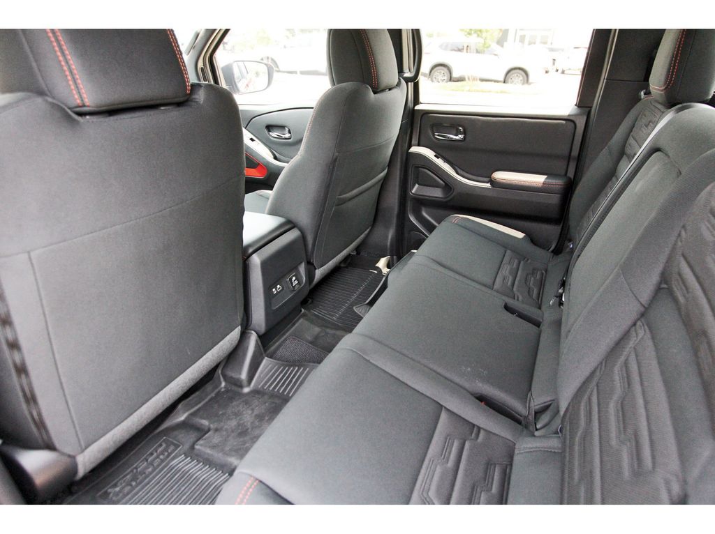 2025 Nissan Frontier PRO-4X Red at Bravo Nissan