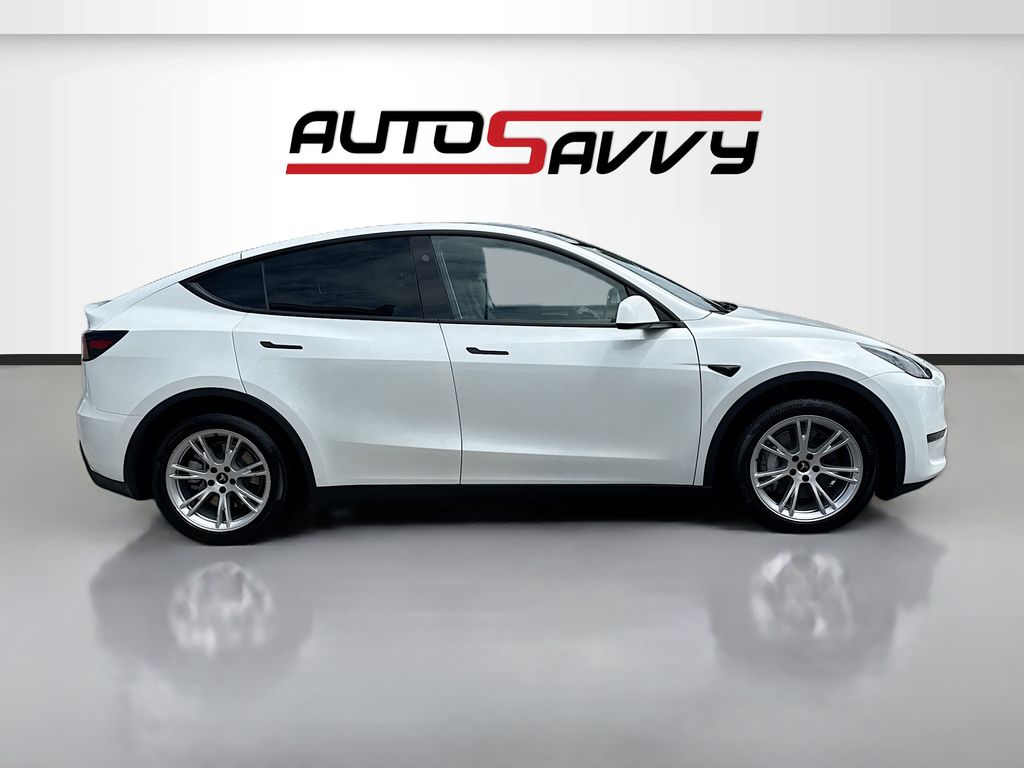 2024 Tesla Model Y Long Range White at AutoSavvy Houston Southwest