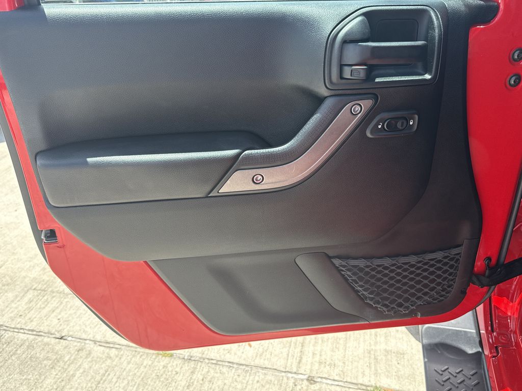 2018 Jeep Wrangler JK Unlimited Sport Red at North Houston Mitsubishi
