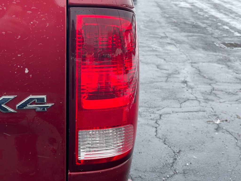 used 2014 Ram 1500 car, priced at $15,000