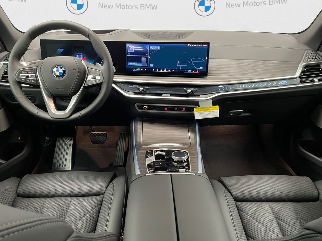 New 2026 Black Sapphire Metallic BMW xDrive50e image 7