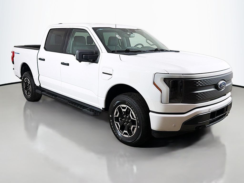 Used 2023 Ford F-150 Lightning XLT with VIN 1FTVW1EL4PWG14196 for sale in Cleveland, OH