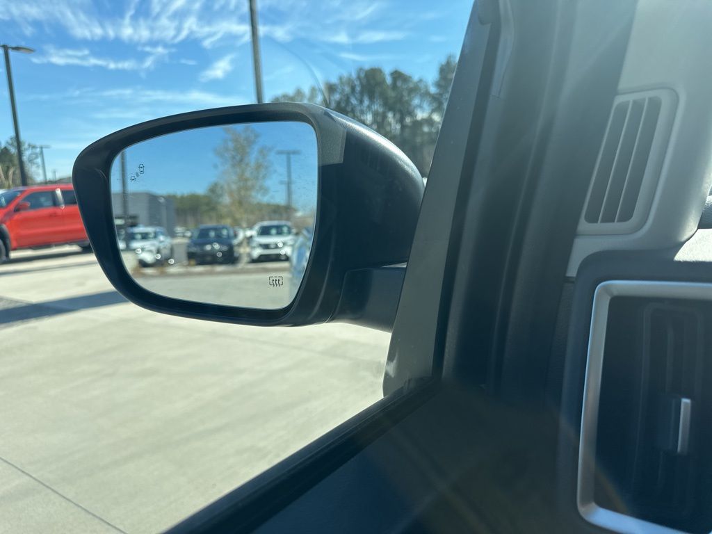 2025 Glacier White Nissan Frontier SV 4X4 Truck