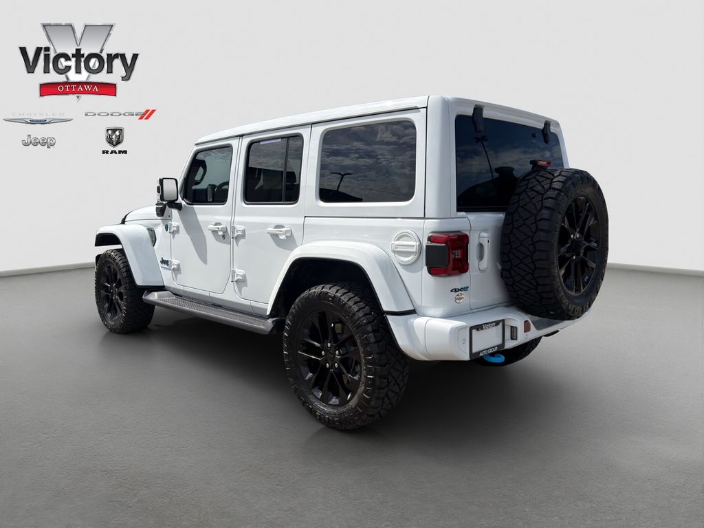 Used 2021 White Jeep Unlimited Sahara High Altitude 4xe image 4
