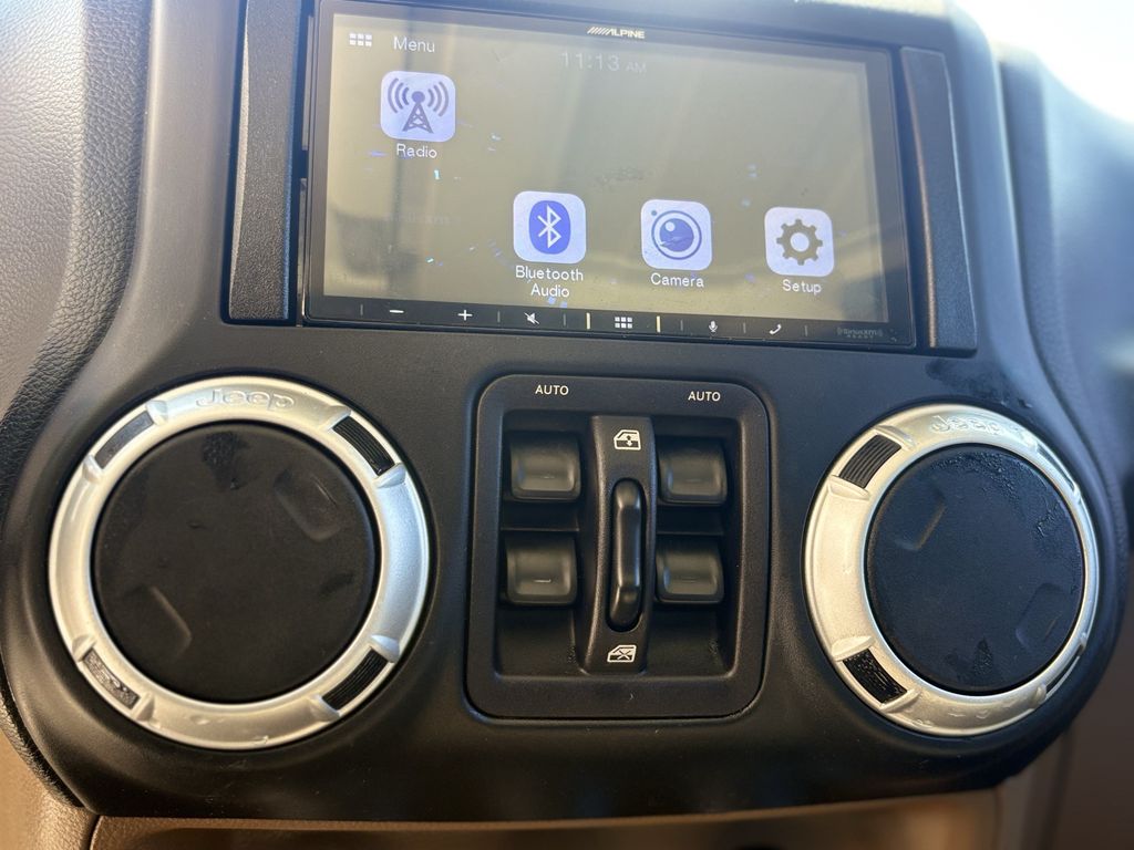 2014 Jeep Wrangler Unlimited Sahara White at Autostrade