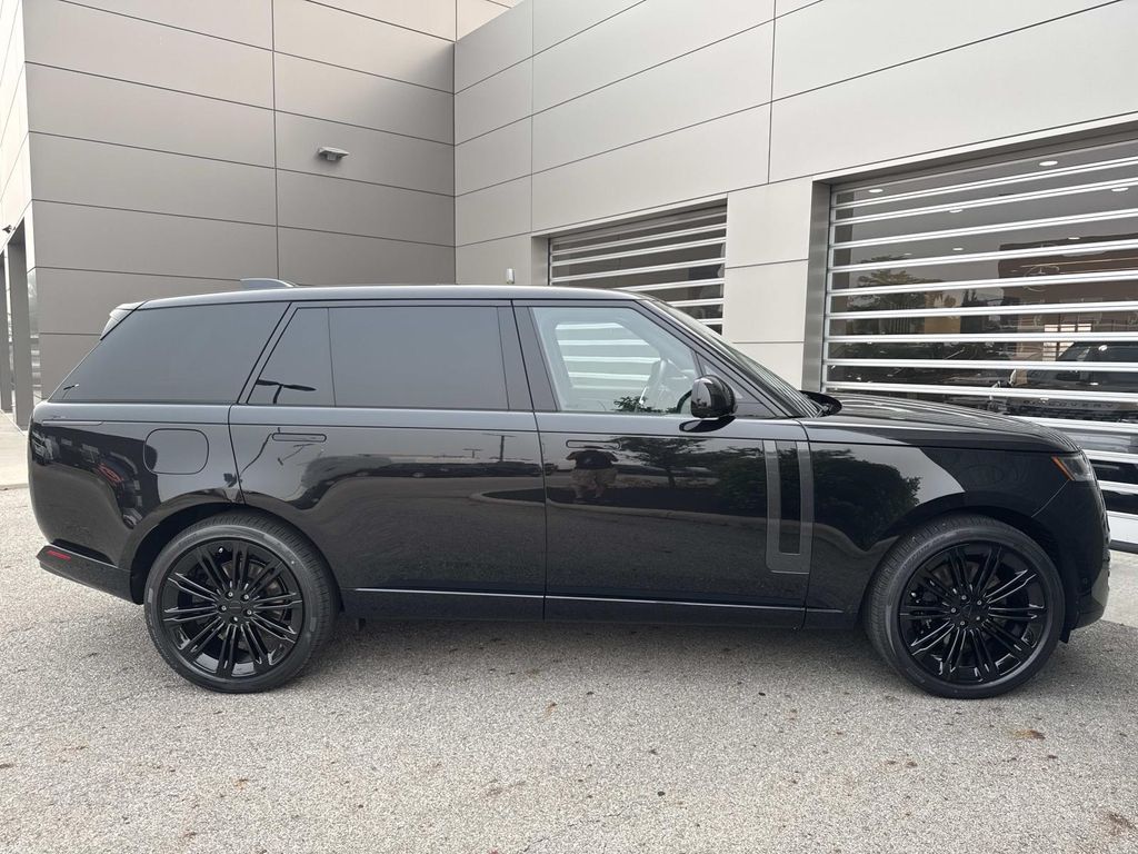New 2026 Black Land Rover SE image 9