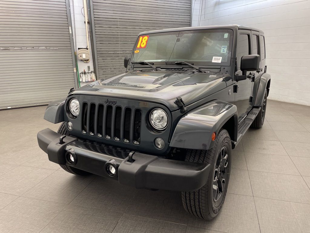 Used 2018 Black Jeep Unlimited Sahara image 3