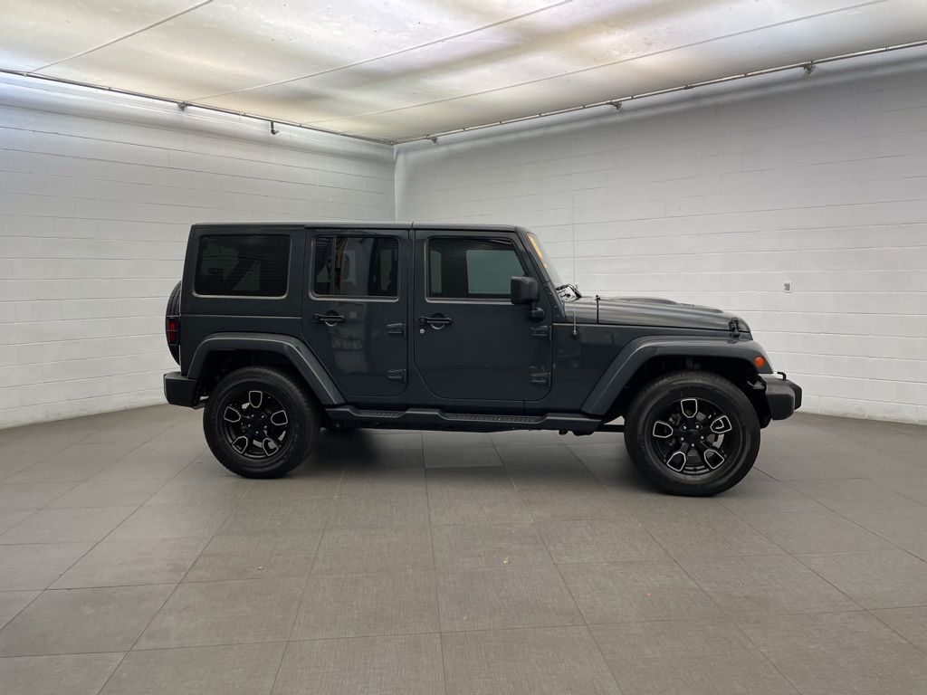 Used 2018 Black Jeep Unlimited Sahara image 4