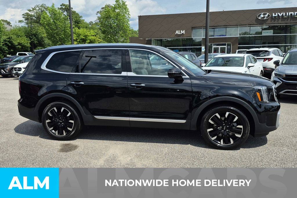 Used 2025 Ebony Black Kia SX-Prestige image 4