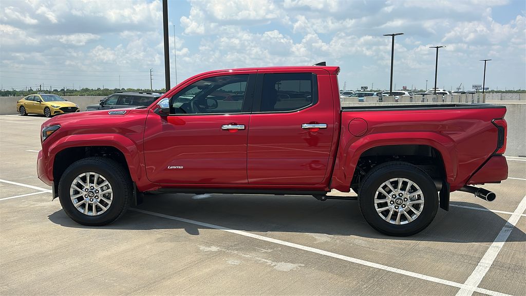 2026 Toyota Tacoma Hybrid Limited Red at EAG Ford Navasota
