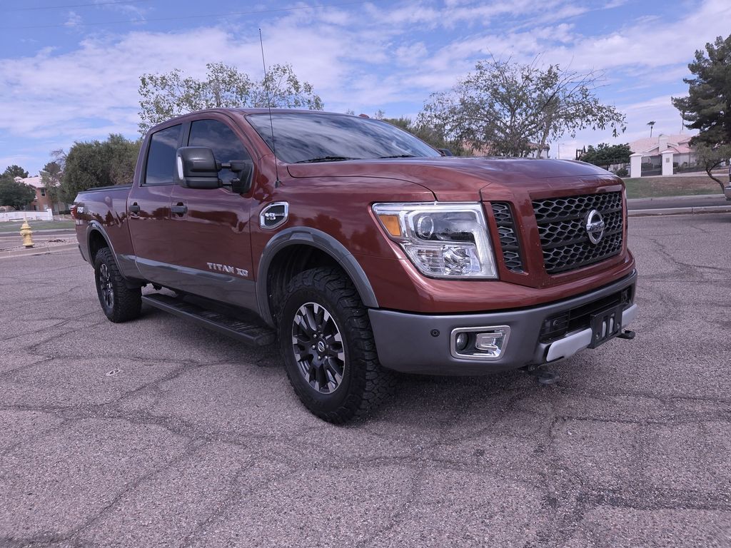 Cayenne Red 2017 Nissan Titan Pickup Truck Four-Wheel Drive 7-Speed Automatic