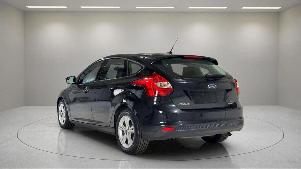 Used 2014 Tuxedo Black Metallic Ford SE image 14