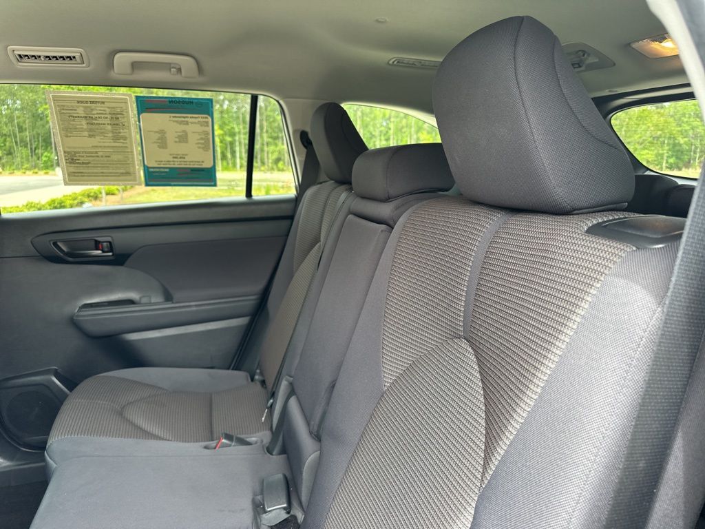 2023 Celestial Silver Metallic Toyota Highlander LE FWD SUV