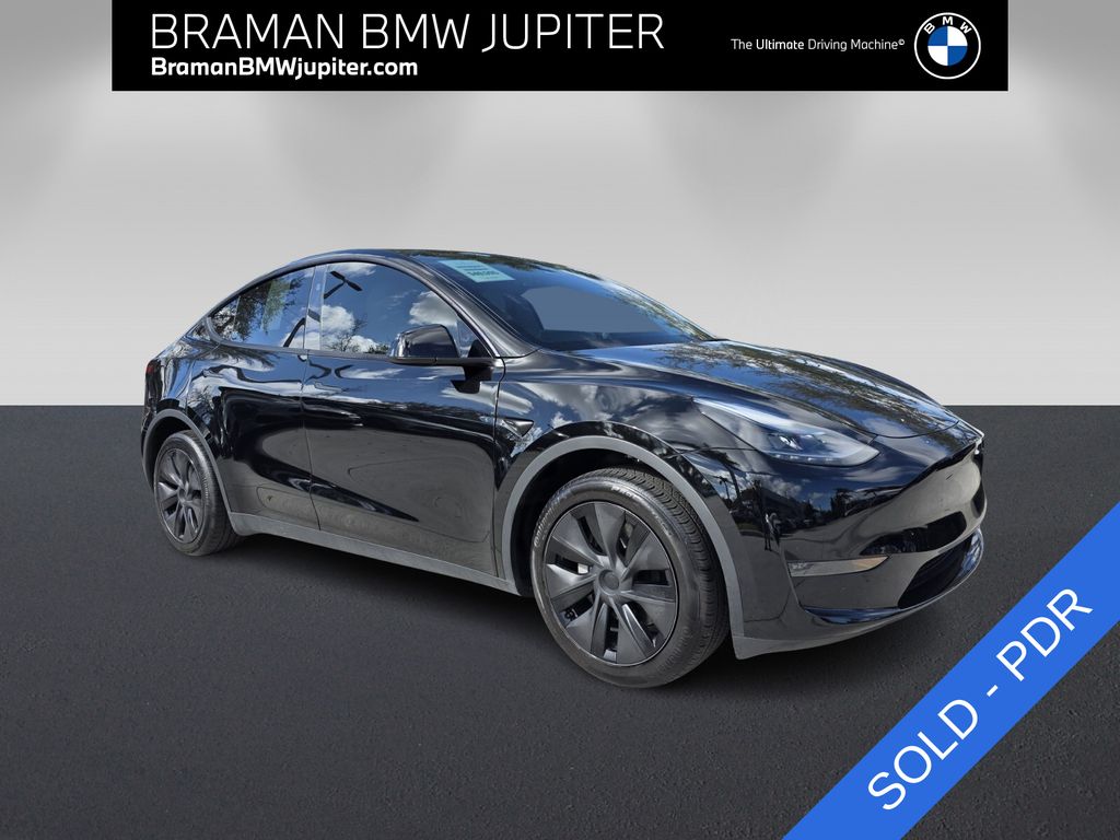 Solid Black 2025 Tesla Model Y Long Range RWD SUV / Crossover Rear-Wheel Drive 1-Speed Automatic