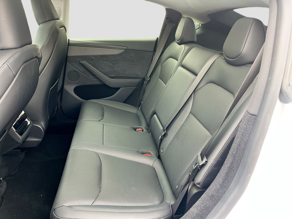 2026 Tesla Model Y Long Range White at AutoSavvy Houston Northwest