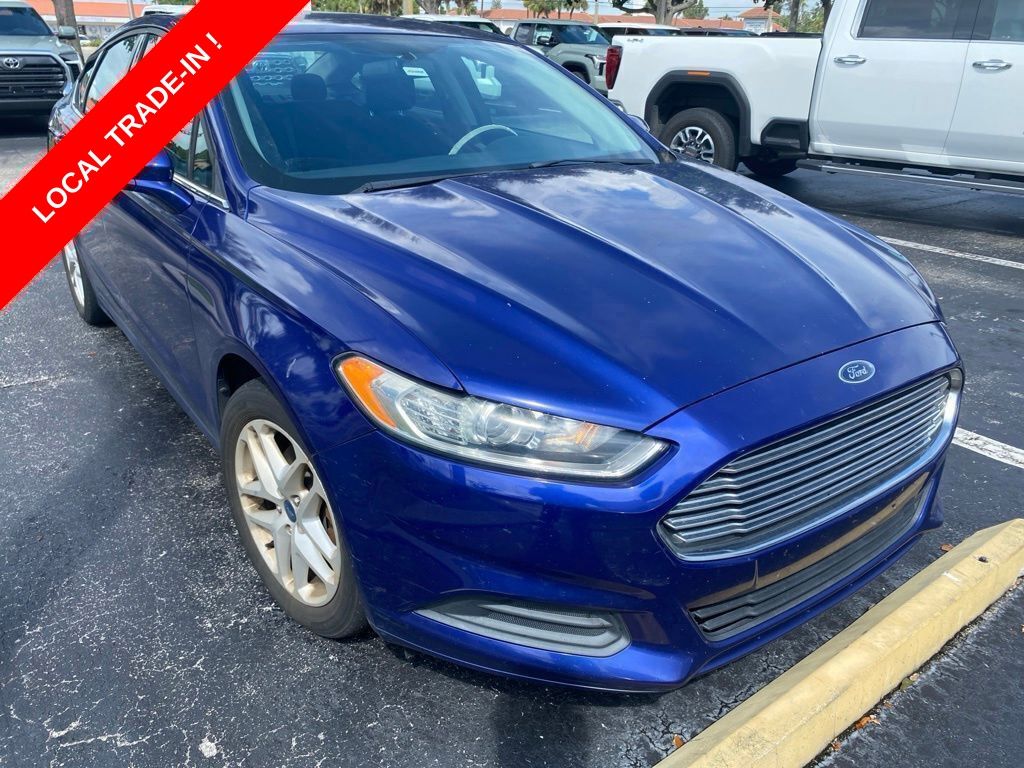 Deep Impact Blue Metallic 2014 Ford Fusion Sedan Front-Wheel Drive 6-Speed Automatic